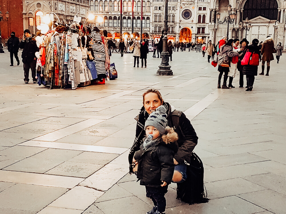 Feeding pidgeons in St Mark's Square and Basilica, Venice