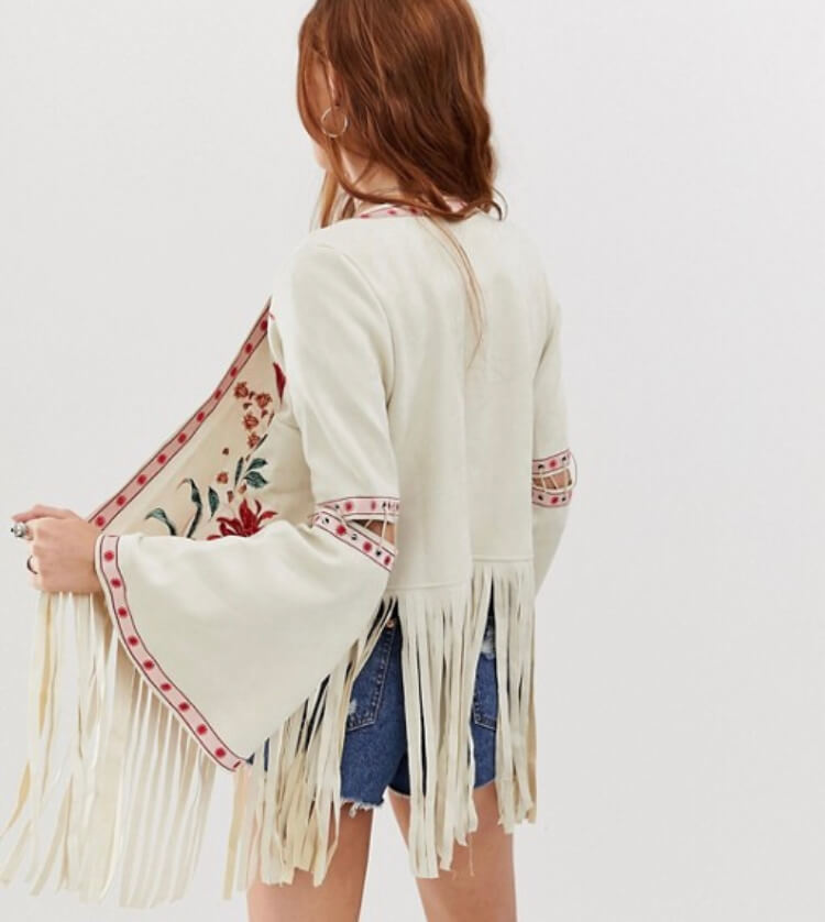 Glamorous embroidered festival jacket with floral embroidery. The perfect festival look. Read more on www.allaboutrosalilla.com