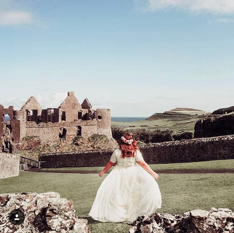 girl wearing dress at medieval castle