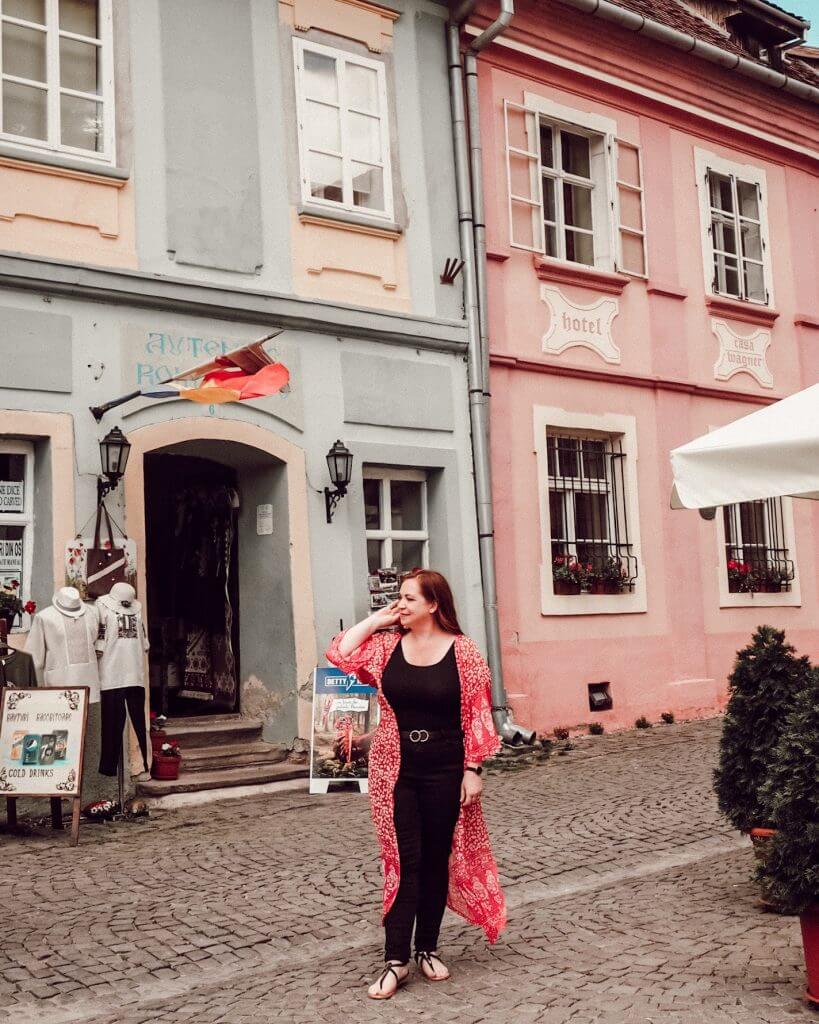 The colourful streets of Medieval Sighisoara in Transylvania Romania. 