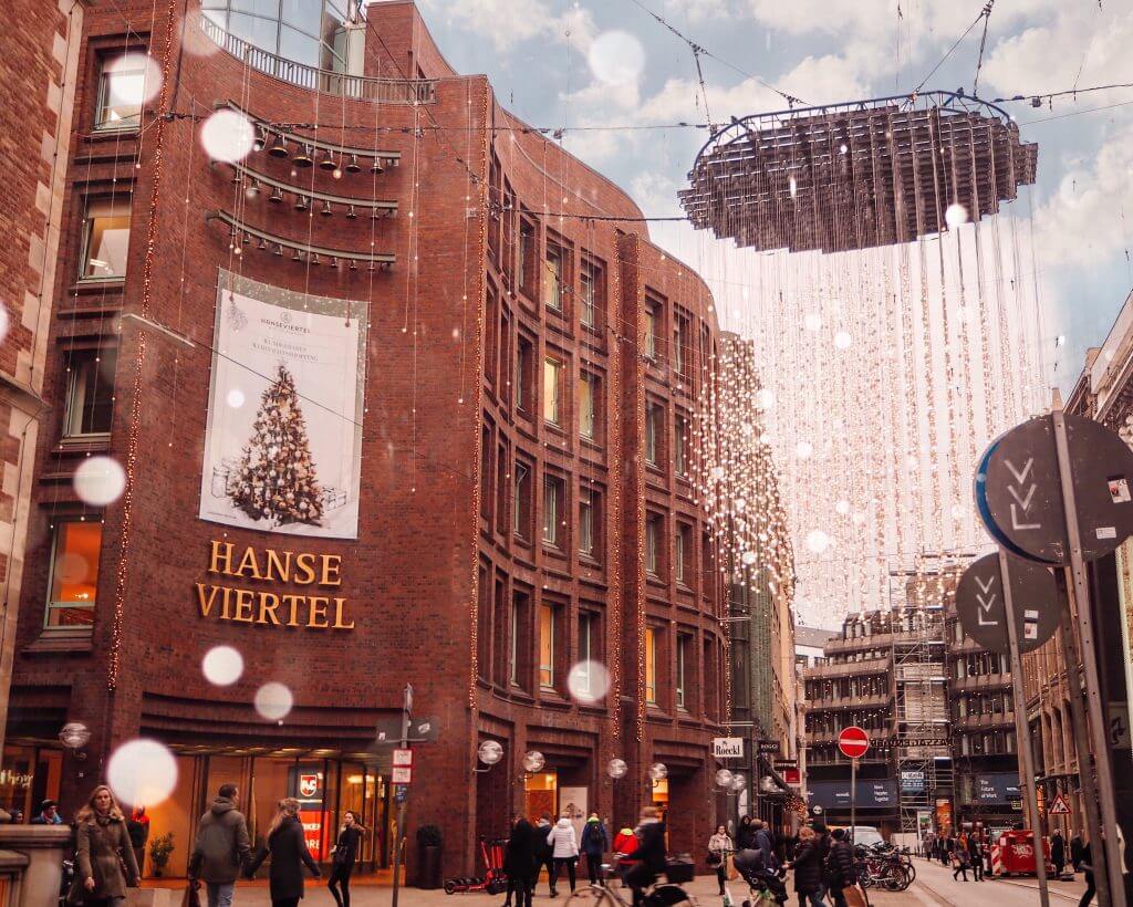 Busy shopping area decorated for Christmas at Passagenviertel Hamburg