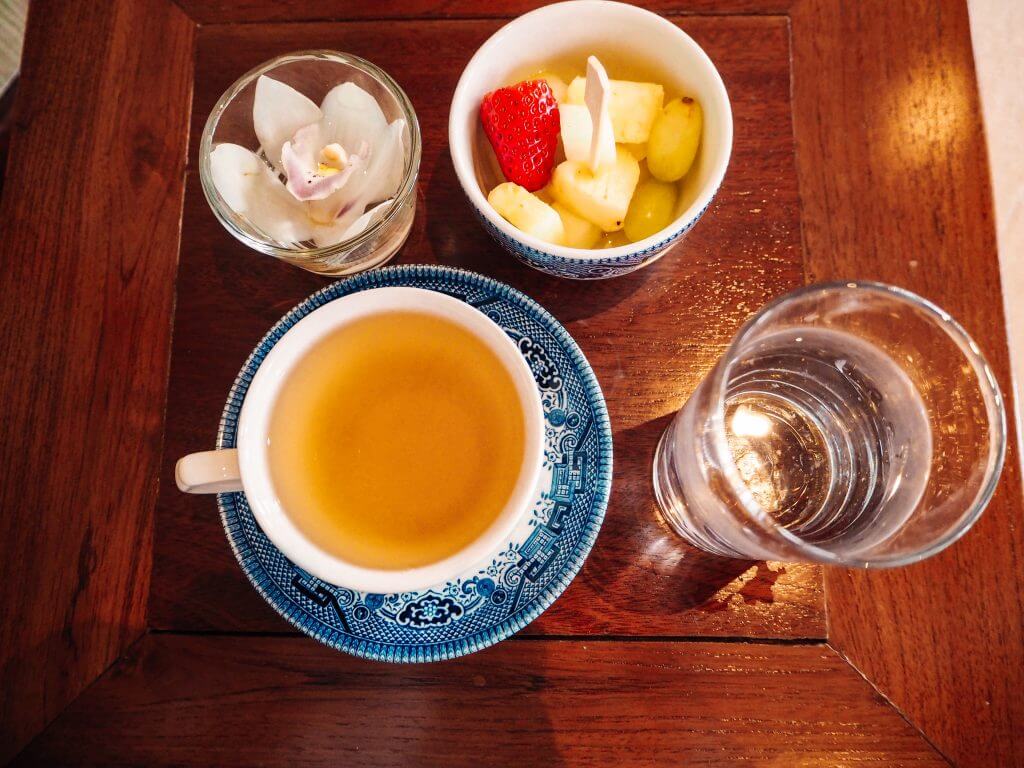 Post treatment treats of water, herbal tea and fresh fruit left on the table of the relaxation room in the Thai Spa at Lough Erne Hotel.