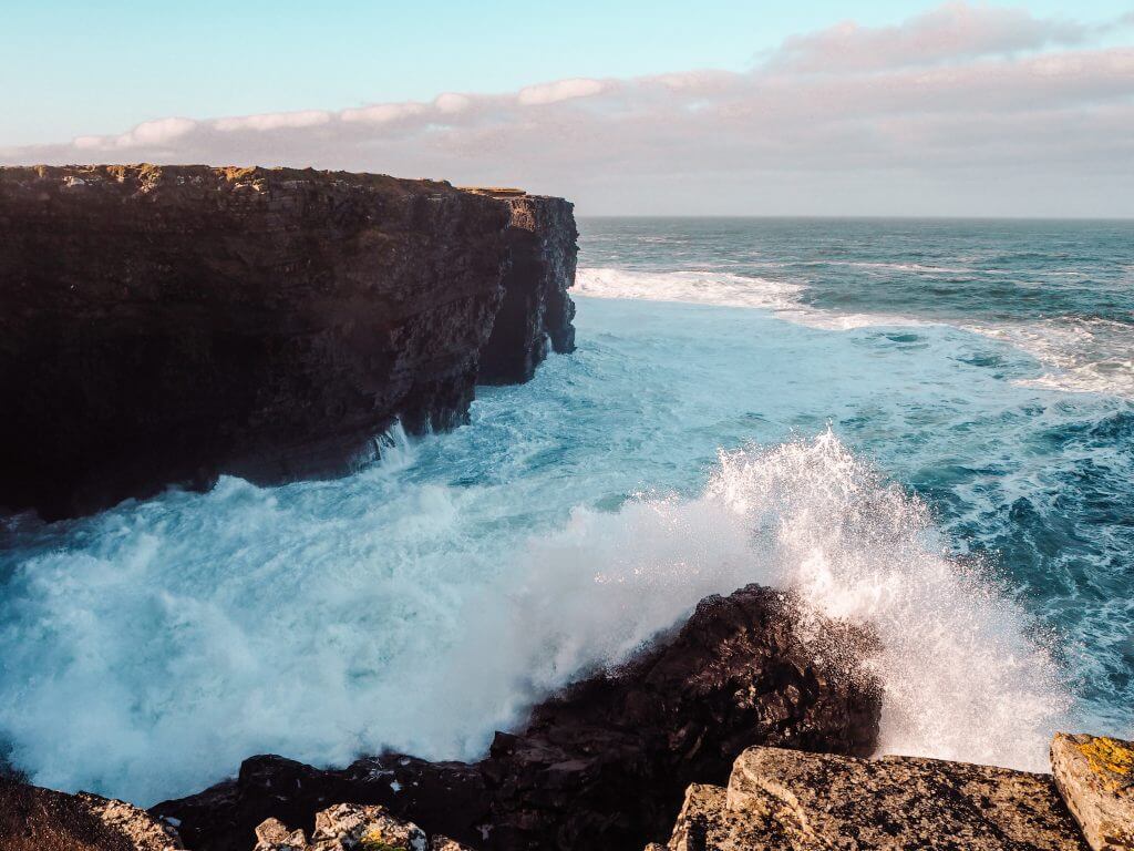 Crashing waves of the Atlantic Ocean on The Wild Atlantic Way in Ireland.
