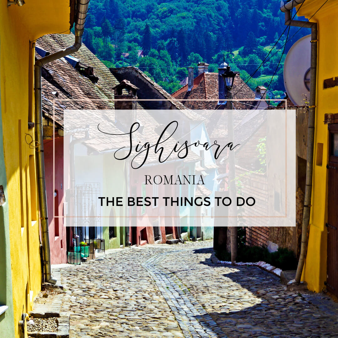 Image of the Romanian village of Sighisoara with text overlay things to do in Sighisoara