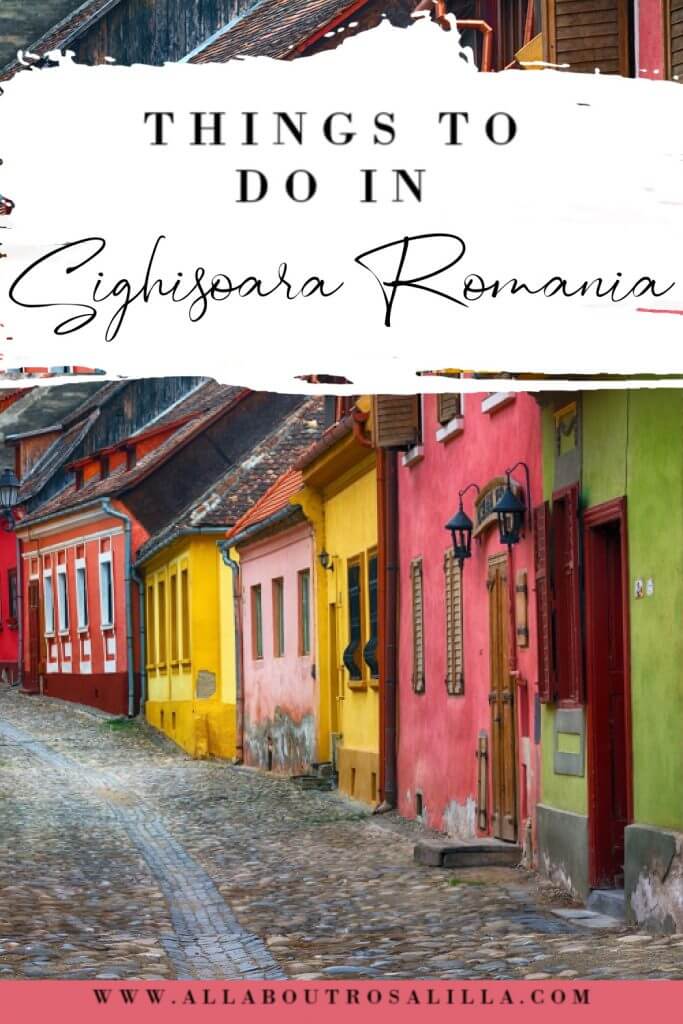 Image of the Romanian village of Sighisoara with text overlay things to do in Sighisoara