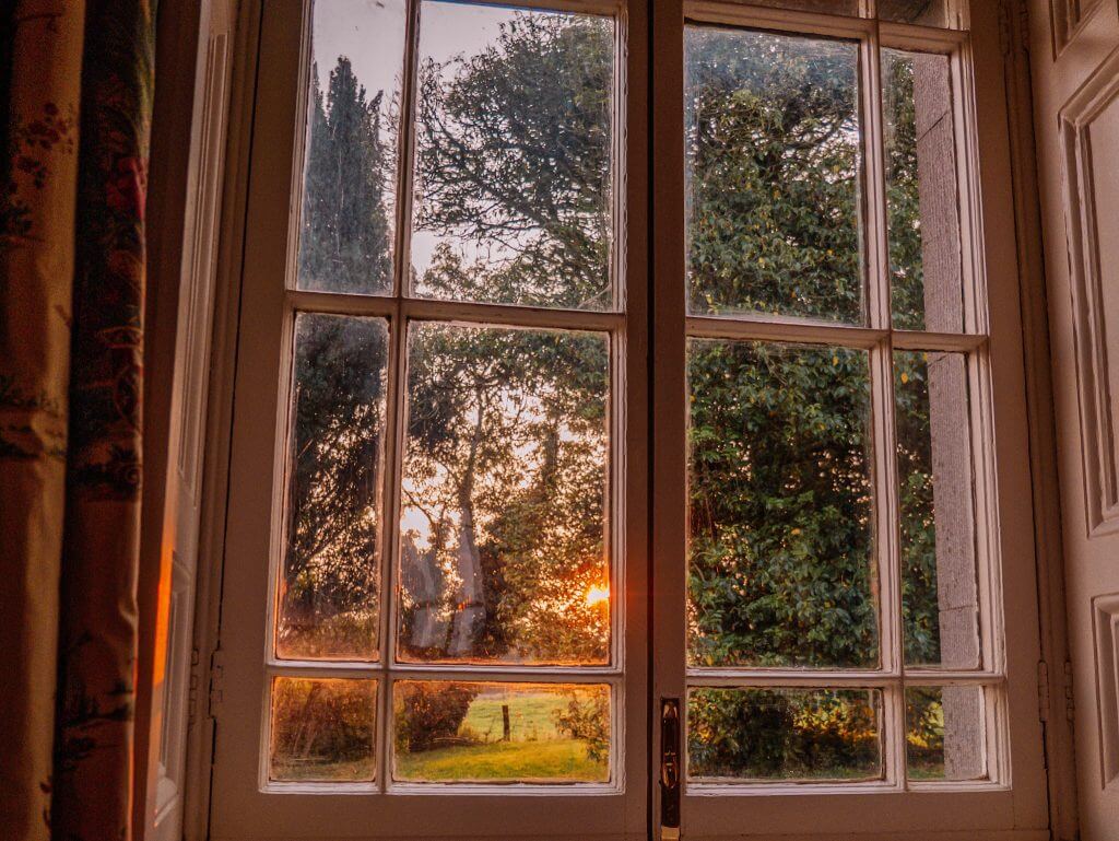 Sun setting through the windows of Loughcrew Lodge