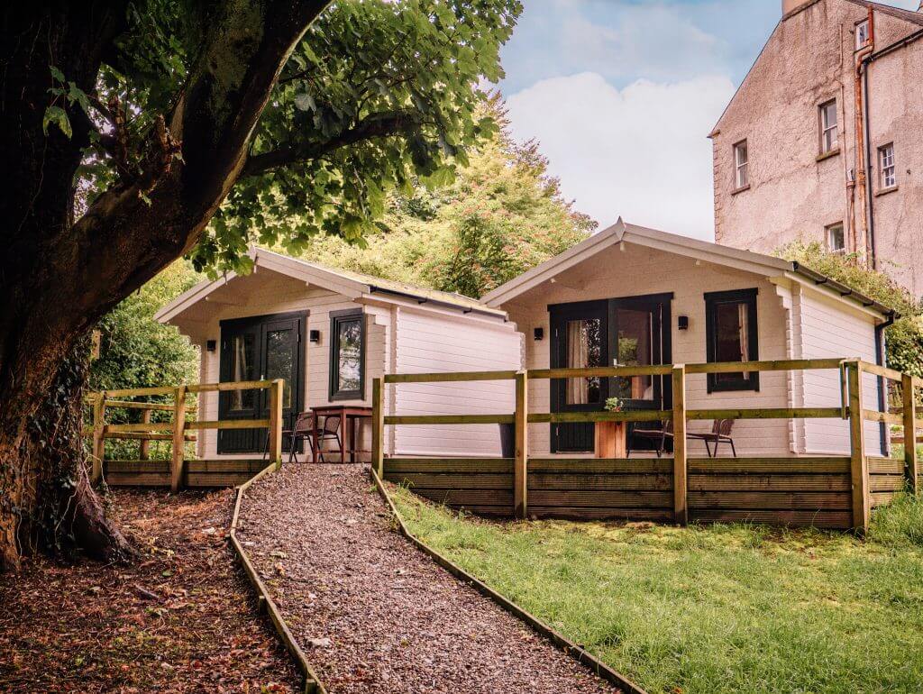 Cosy cabins at Dunmore House and Gardens at the base of the Inishowen peninsula in Donegal Ireland perfect for your staycation in Ireland.