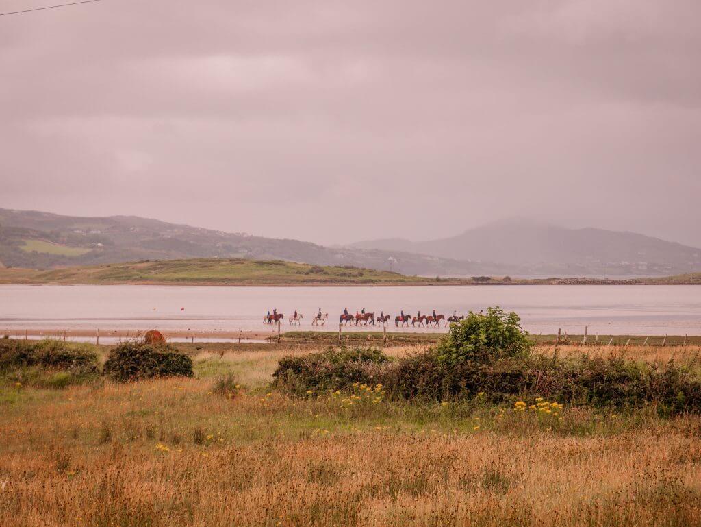 Horseriding on Portsalon Beach Donegal one of the many things to do in Donegal