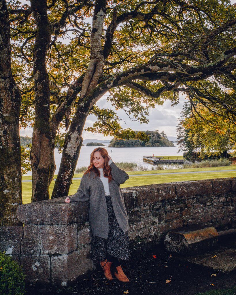 Woman enjoying the gardens at a luxury hotel stay in Ireland