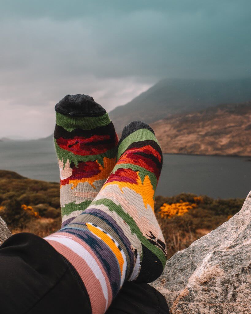 Image of Connemara socks with a backdrop view of Connemara Ireland