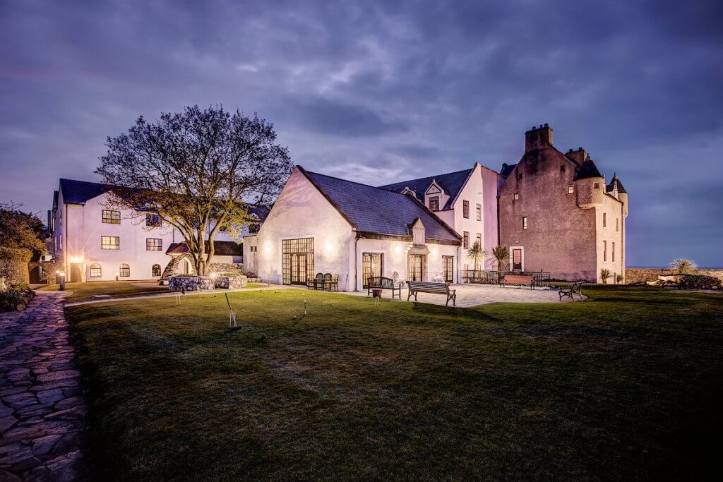 Exterior and gardens of Ballygally Castle Hotel Northern Ireland