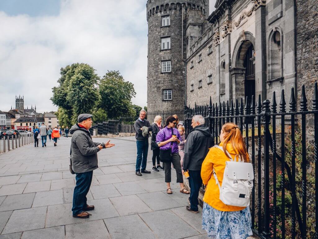 Group of travellers on a walking tour of Kilkenny Ireland