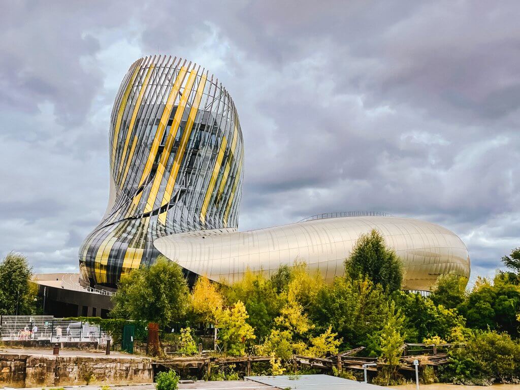 The exterior of the cite du vin wine museum in Bordeaux France