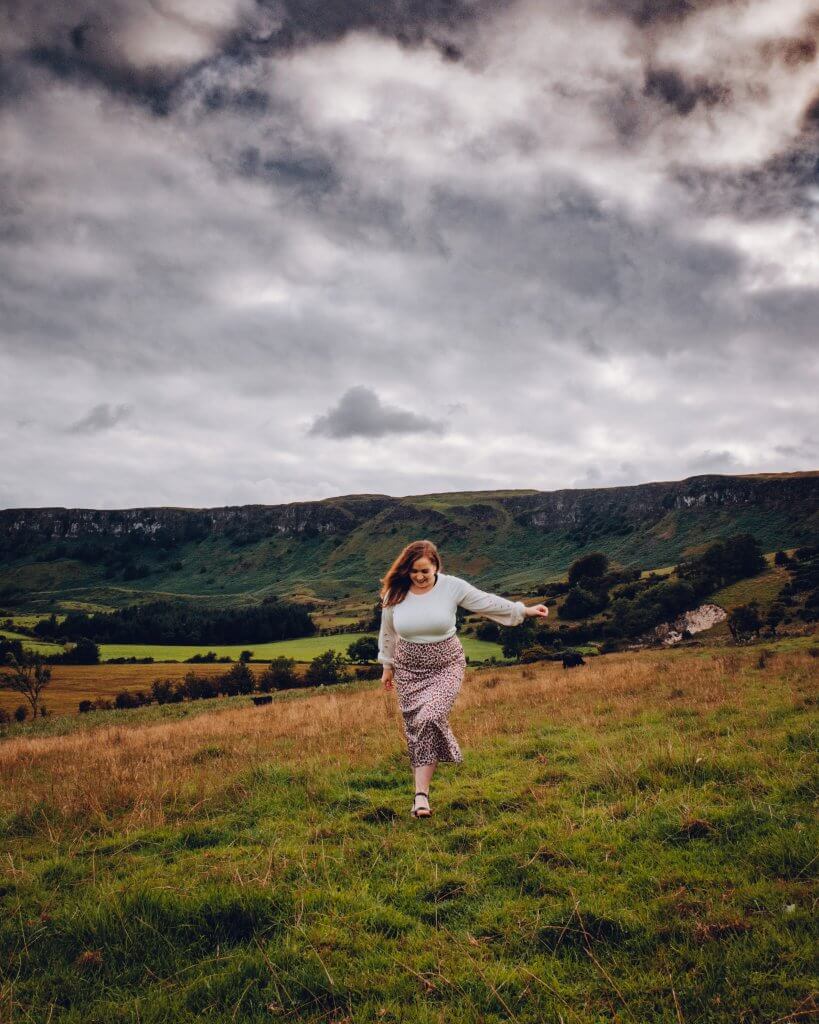 Woman walking at Sallagh Braes a hidden gem in Antrim