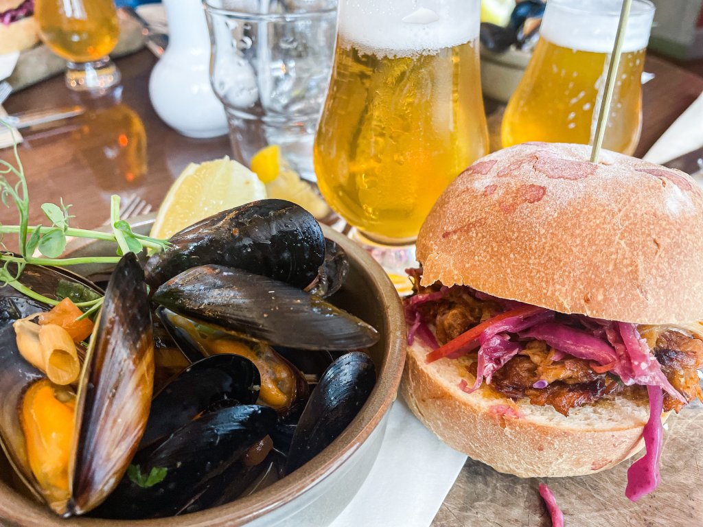 Plate of mussels and a pulled pork bap on a Galway food tour