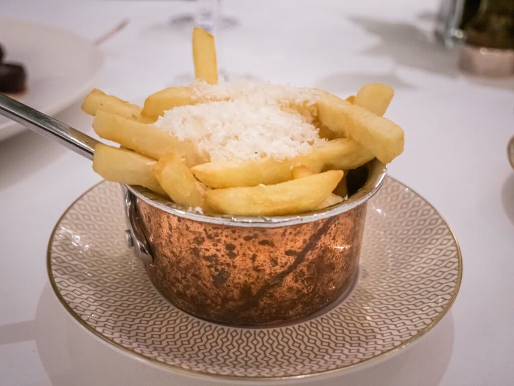 Basket of truffle chips served at The Falls restaurant in Sheen Falls Lodge.