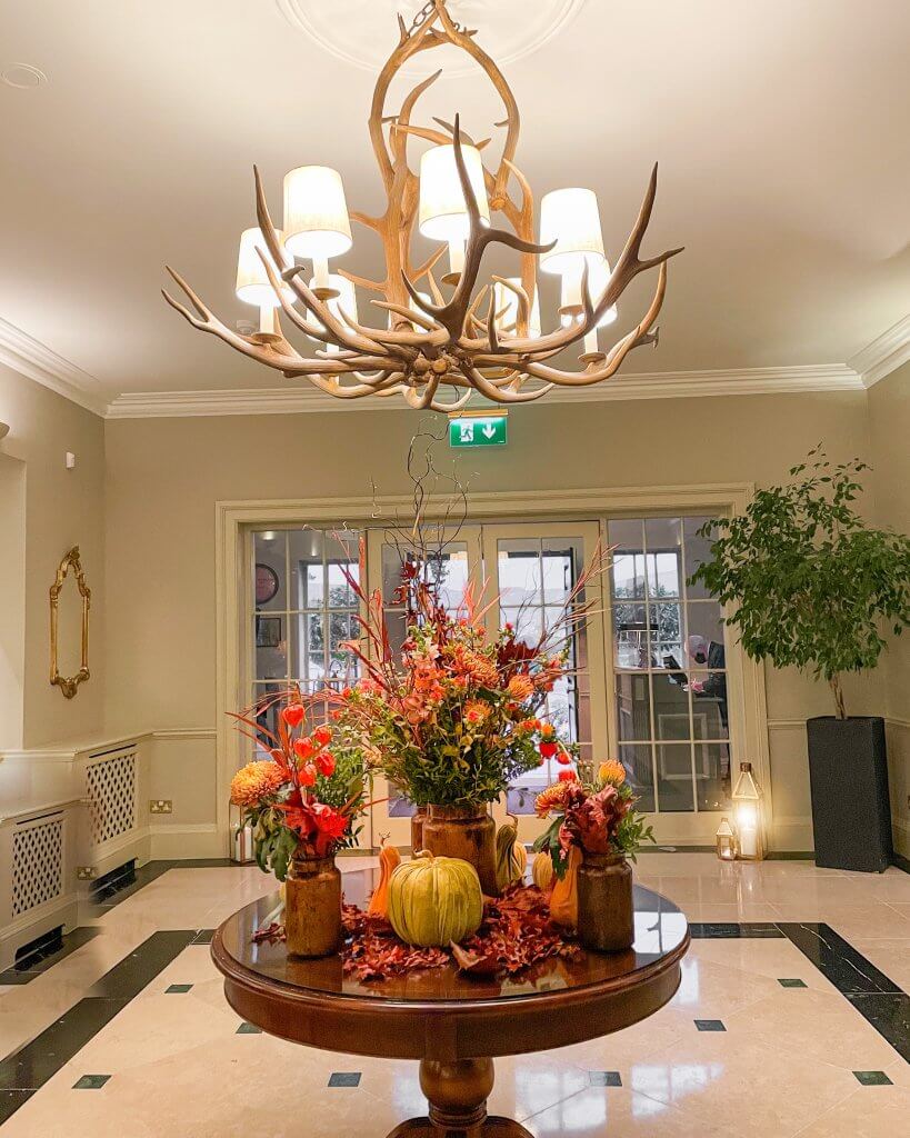 Sheen Falls Lodge's elegant lobby, welcoming guests with its stylish décor and impeccable hospitality. Located in Kenmare, Ireland, Sheen Falls Lodge is one of Ireland's most elegant 5-star hotels.