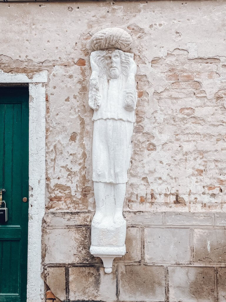 Turbaned Arab statues at Campo dei Mori in Cannaregio Venice Italy