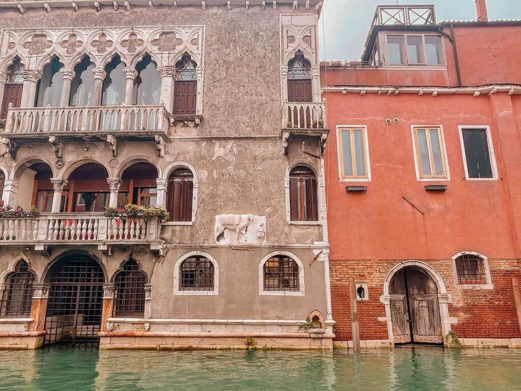 Back of Tintoretto's House in Cannaregio Venice showing a stone carving of an Arab trader leading a camel