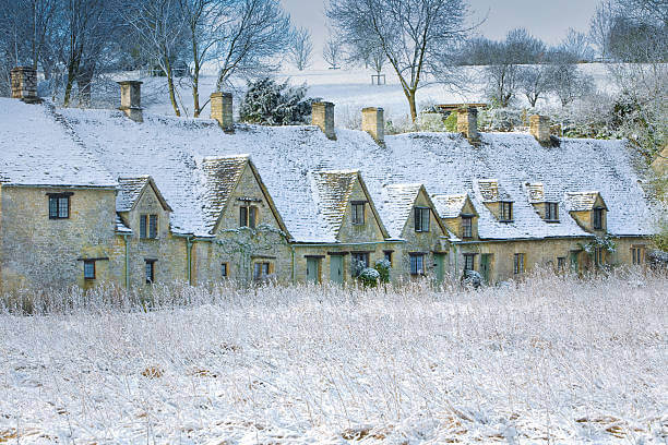 The famous Arlington Row in Bibury, The Cotswolds, dusted with January snow