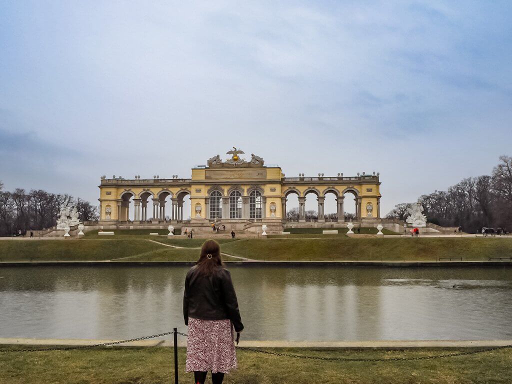 Woman standing at Gloriette in Schonbrunn Palace in Vienna