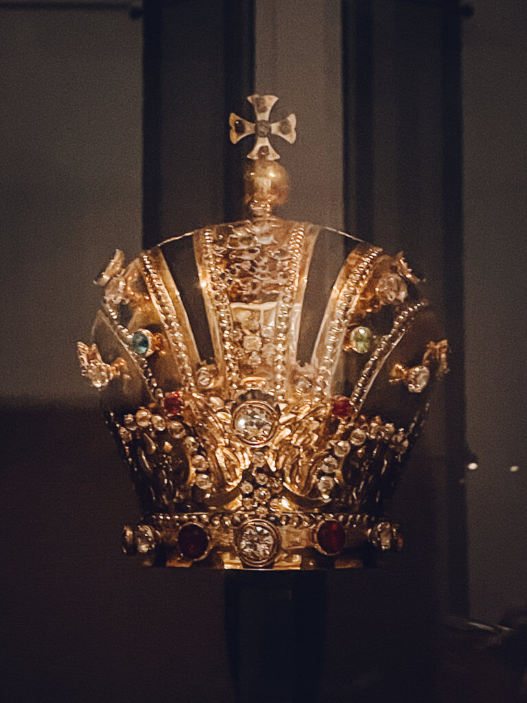 Ornate crown of the child of Prague in the museum at the church of our lady of victories