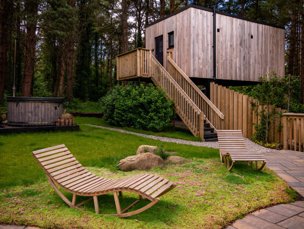 Outdoor seating area in a romantic treehouse Ireland
