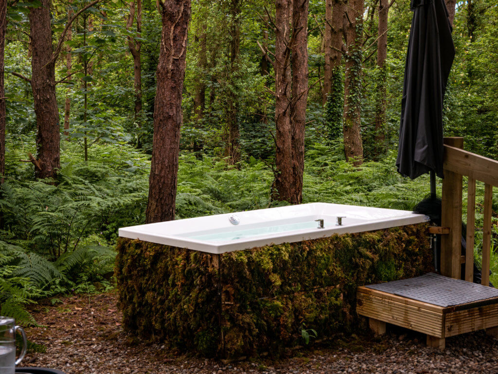Moss covered hot tub at Burrenmore Nest Ireland