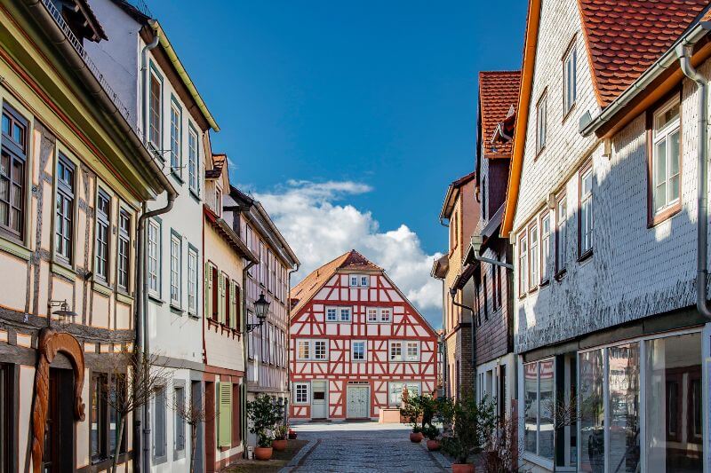 Quiet street in Michelstadt lined with well-preserved half-timbered houses.