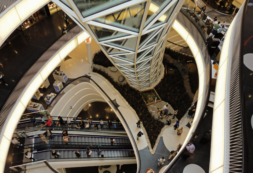 Shoppers on MyZeil’s escalators, marveling at the innovative glass structure.