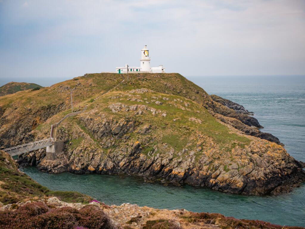 Strumble Head Lighthouse on the Pembrokeshire Coast in West Wales a must see during your 3 day Wales Itinerary