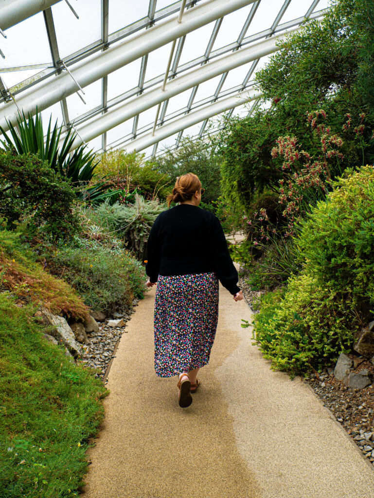 Woman walking around the National Botanic Garden of Wales