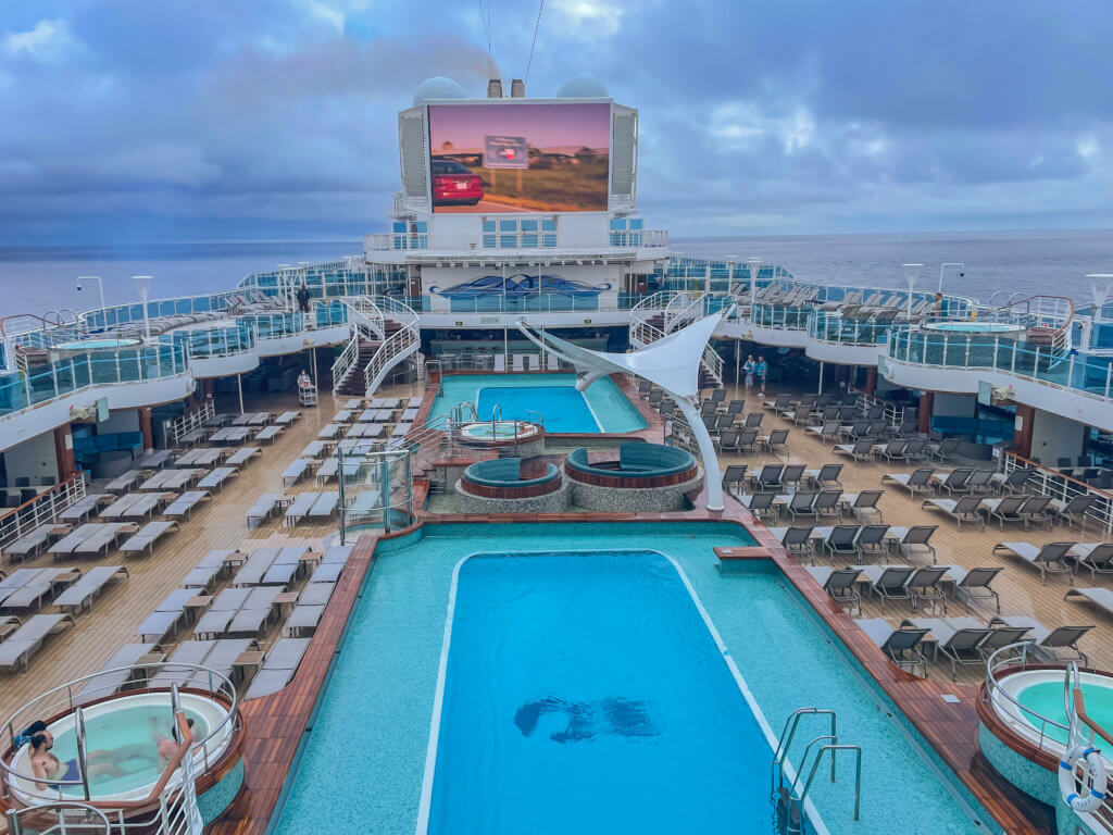 Pool area and movies under the stars onboard Sky Princess Princess Cruises