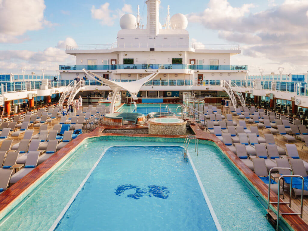 Pool area with sun loungers on Sky Princess Cruise Ship