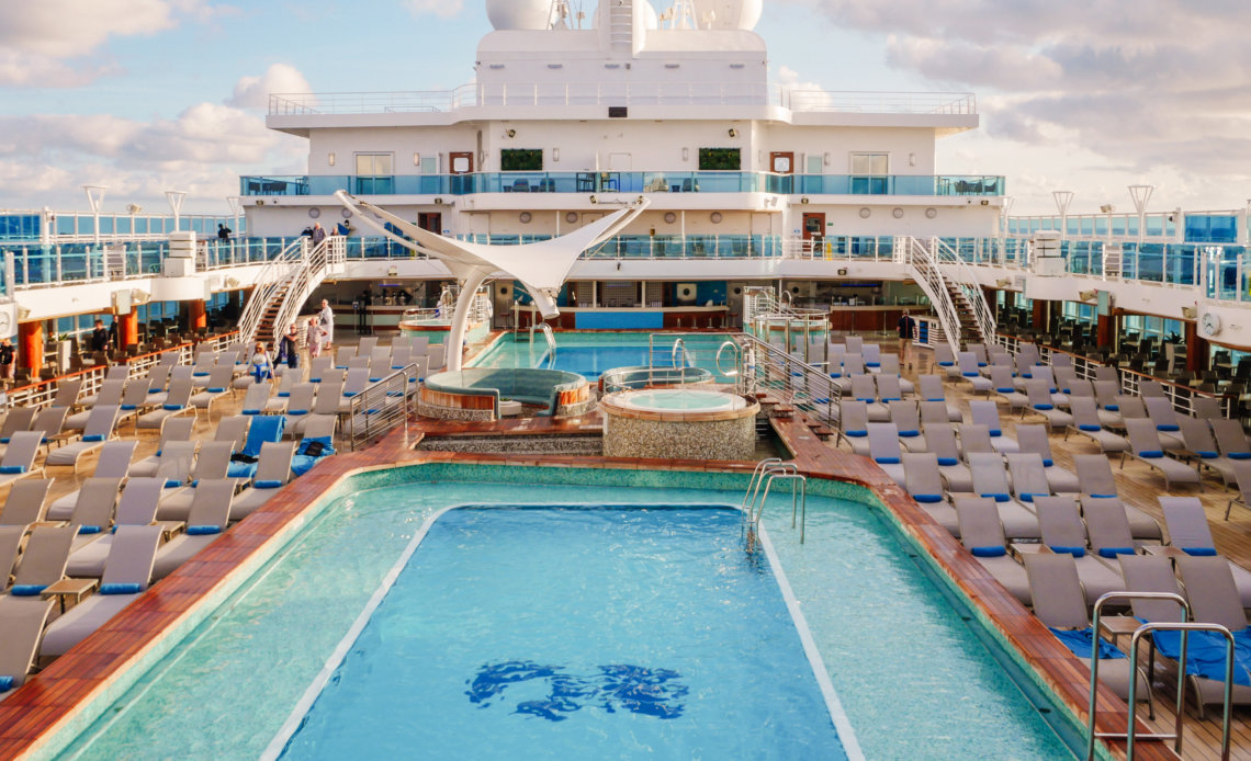 Pool area with sun loungers on Sky Princess Cruise Ship