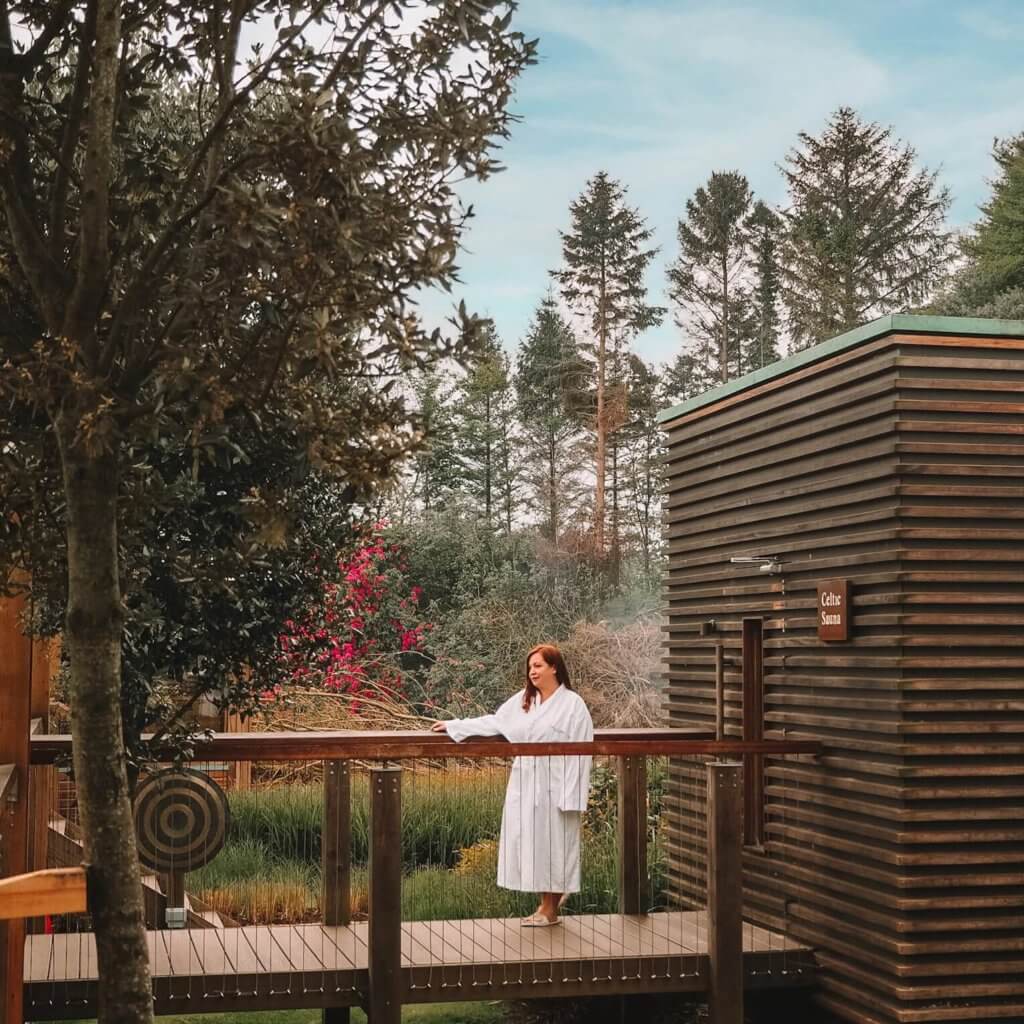 Woman in a white bath robe relaxing at Galgorm spa and resort