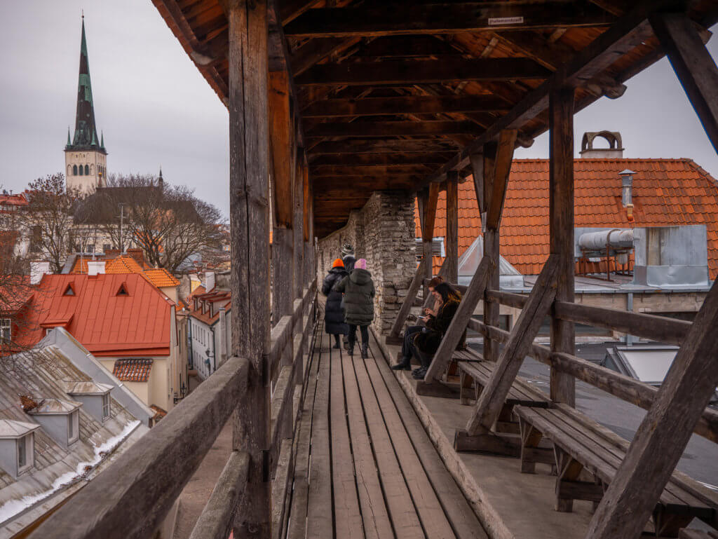 People walking on the wooden walkway of Hellemann Tower in Old Town Tallinn 