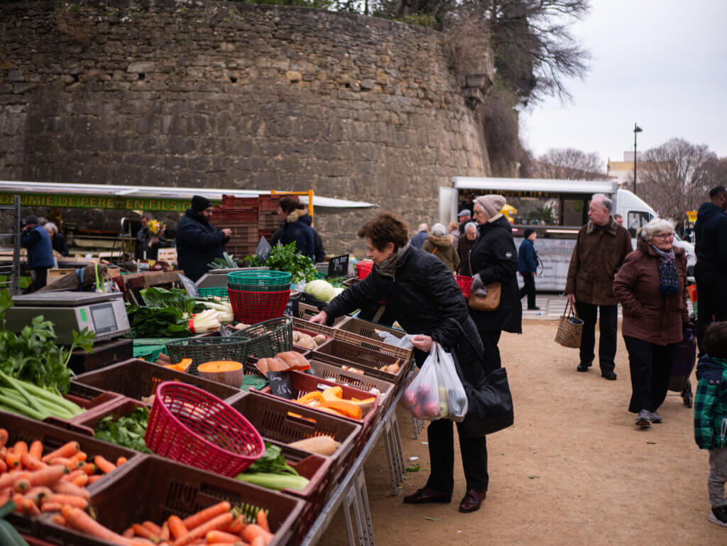 People shopping at the food market in Carcassonne France