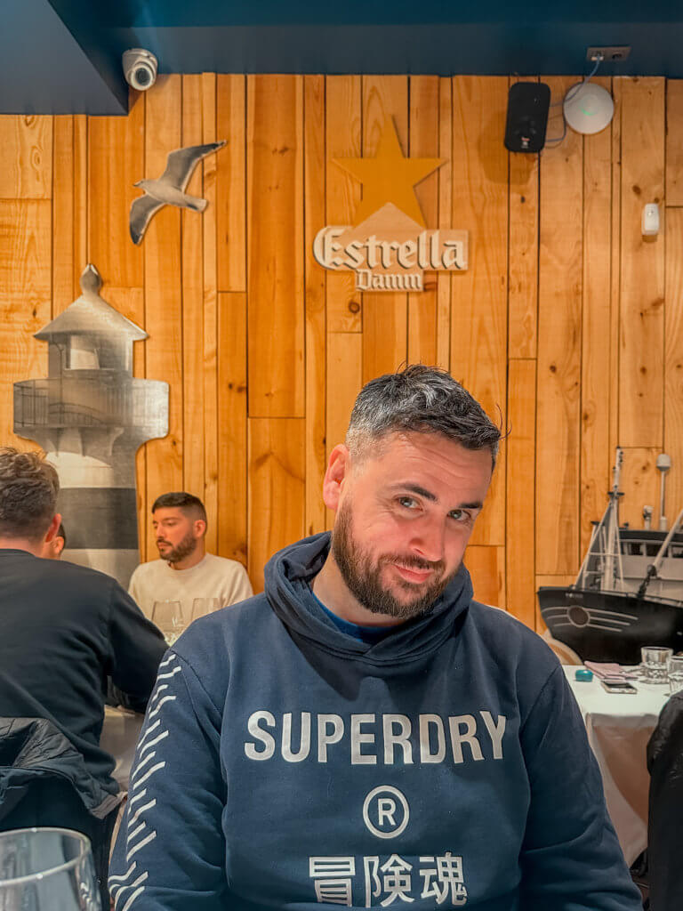 Man eating at La Escotilla restaurant in Vitoria Gasteiz Spain
