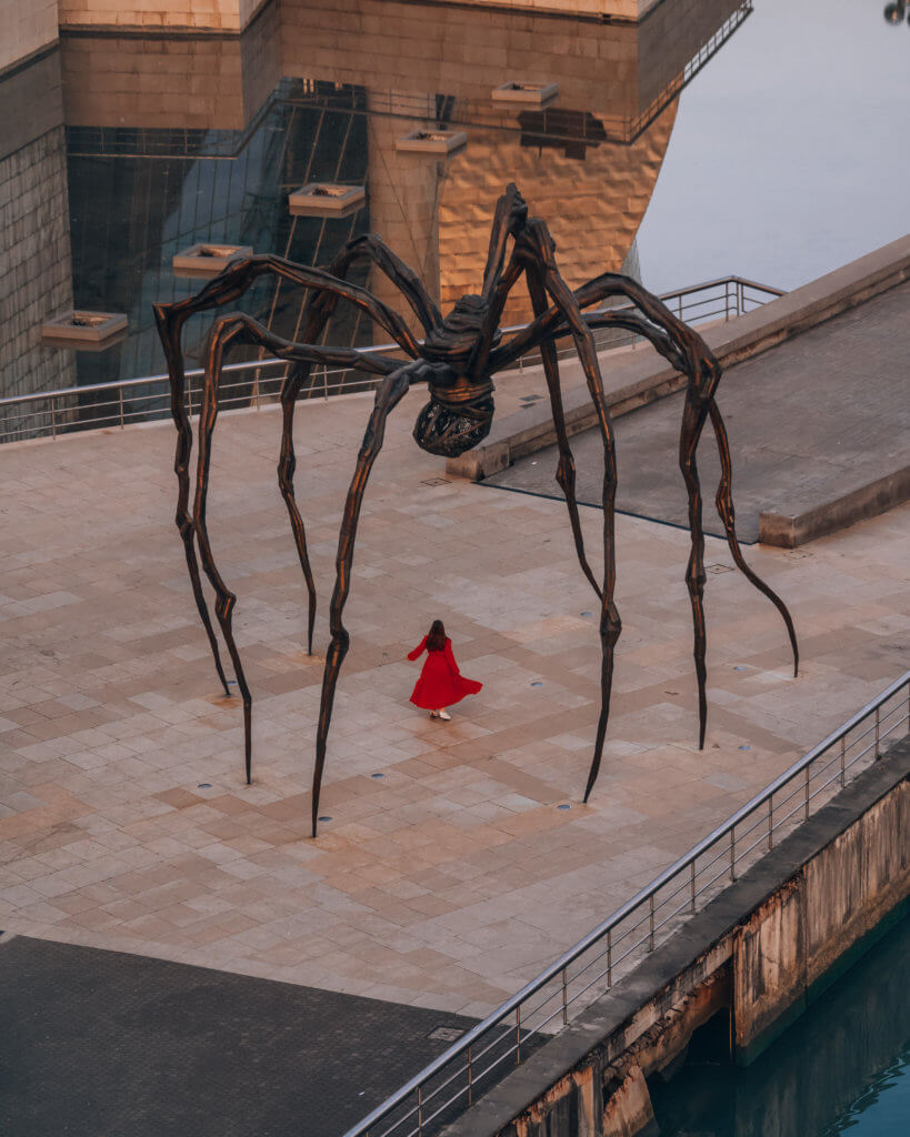 Nicola standing under the spider sculpture 'Maman' at the Guggenheim museum in Bilbao