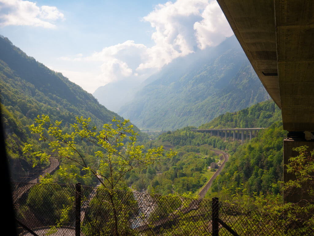 Views of a bridge and railway line from the Gotthard Panorama Express