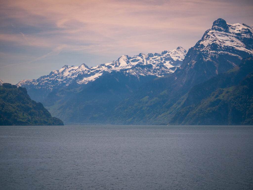 Lake Lucerne surrounded by mountains at sunset