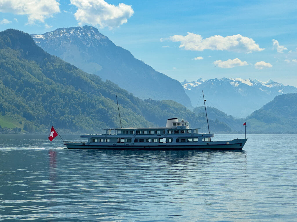 Modern motorboat on Lake Lucerne in Switzerland part of the Gotthard Panorama Express.