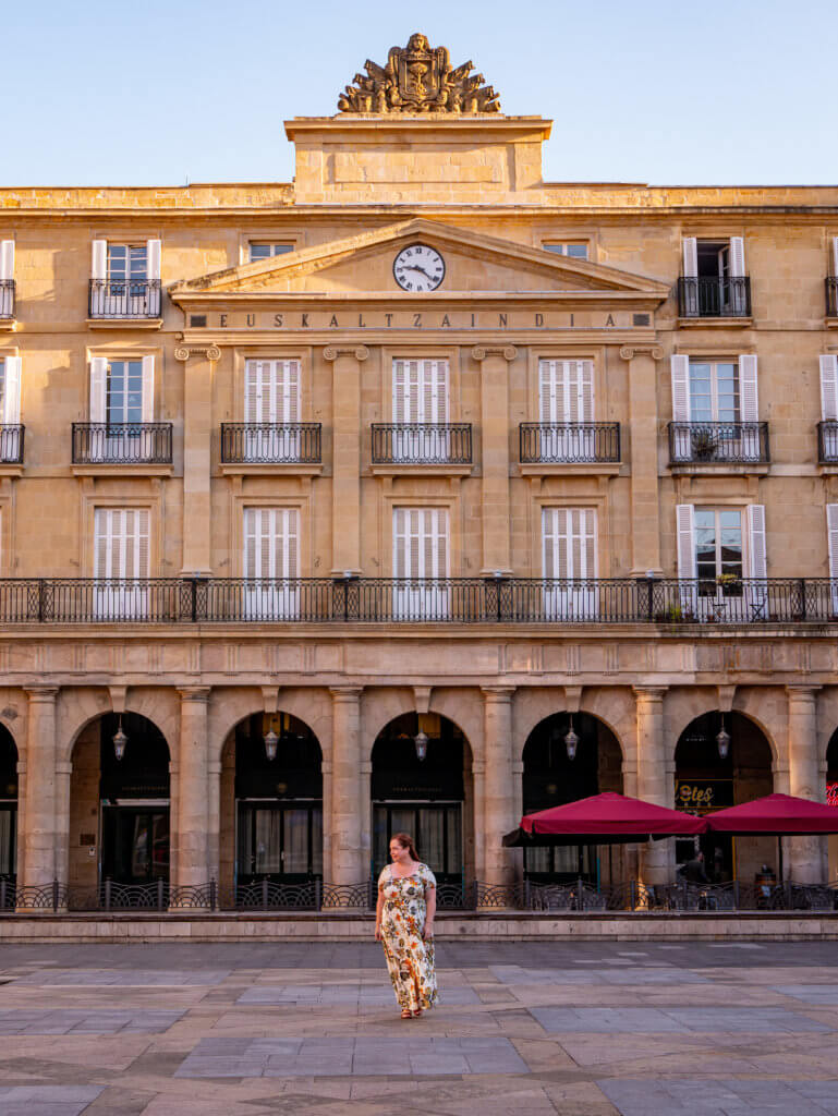 Nicola walks in Plaza Neuva in Bilbao Spain