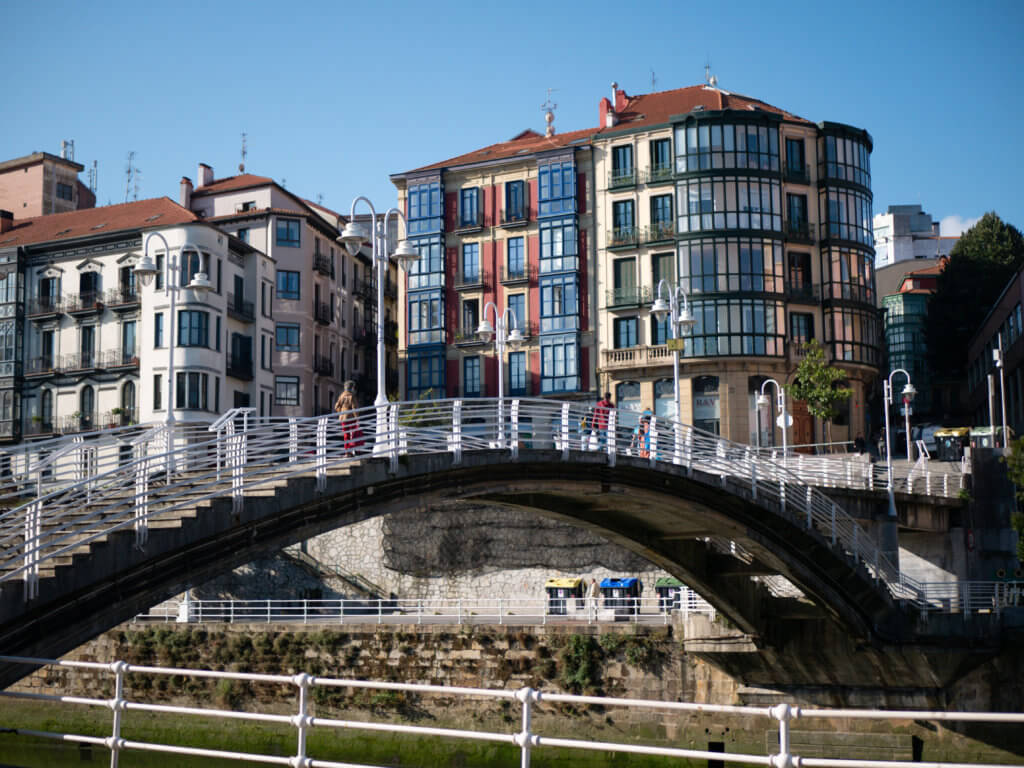 Bridge crossing the river into old town Bilbao
