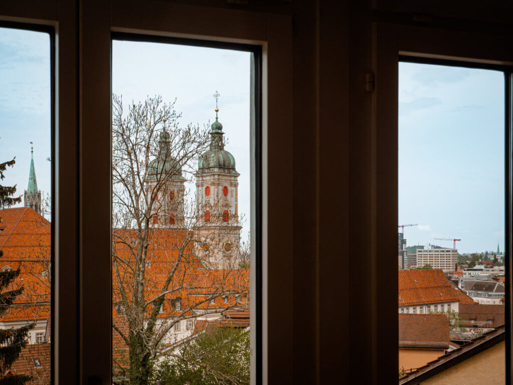 View of St.Gallen cathedral from the bedroom window of the junior suite in Einstein St. Gallen hotel