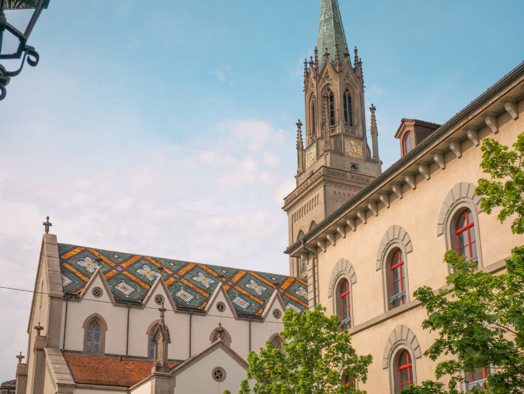 Colourful tile roof of St. Lawrence Church in St. Gallen old town