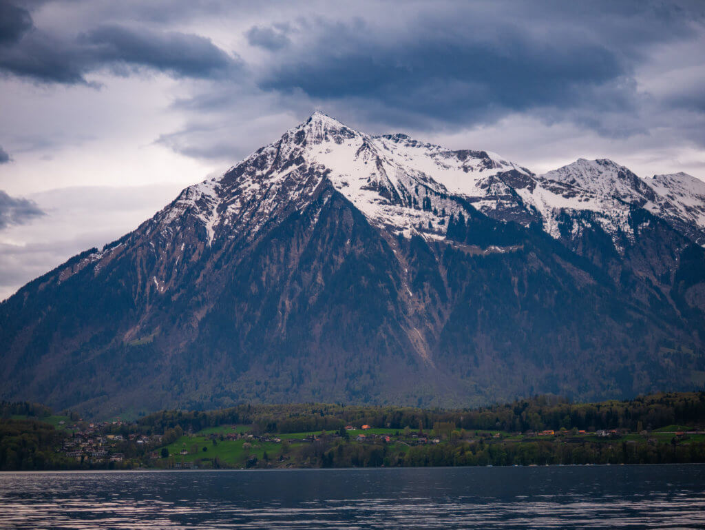 Snow-capped mountain at Lake Thun in Switzerland