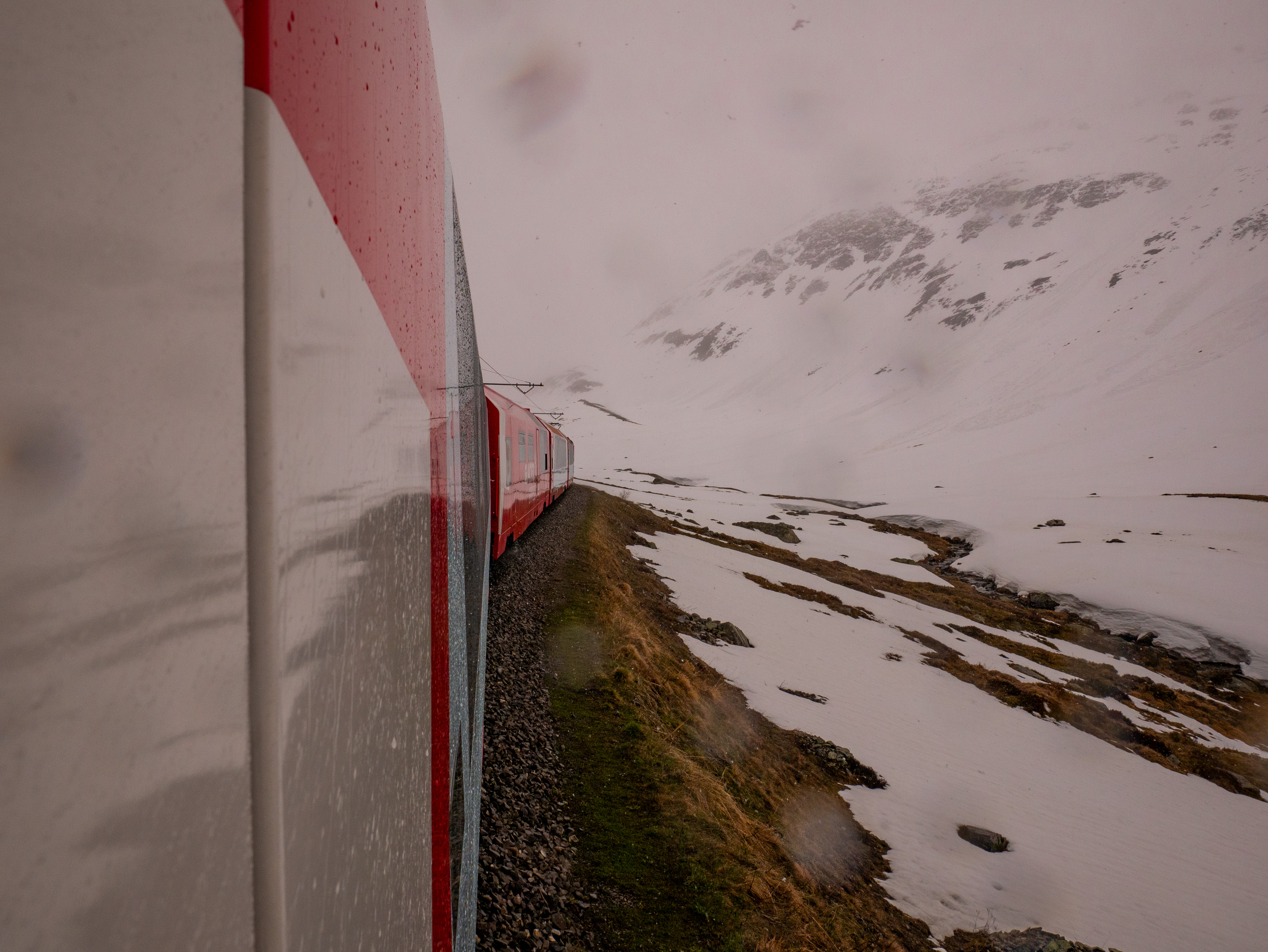 Glacier Express panoramic train travelling through the Swiss Alps