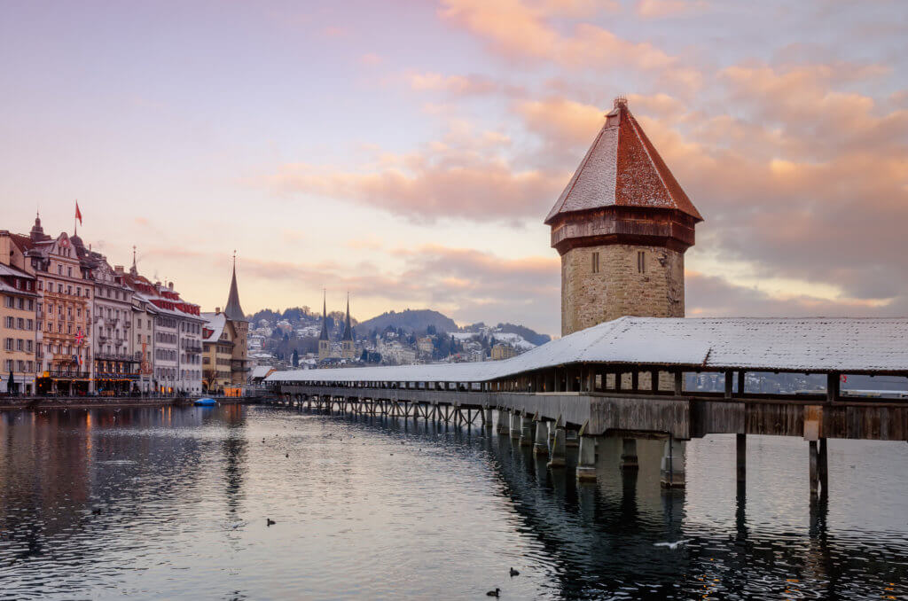 Historic city centre of Lucerne in winter with view of the famous wooden chapel bridge